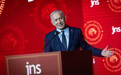 Prime Minister Benjamin Netanyahu speaks at the Jewish News Syndicate conference in Jerusalem, on April 27, 2025. (Yonatan Sindel/Flash90)