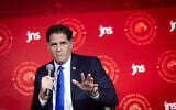 Strategic Affairs Minister Ron Dermer speaks at the Jewish News Syndicate conference in Jerusalem, April 28, 2025. (Chaim Goldberg/Flash90)