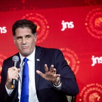 Strategic Affairs Minister Ron Dermer speaks at the Jewish News Syndicate conference in Jerusalem, April 28, 2025. (Chaim Goldberg/Flash90)