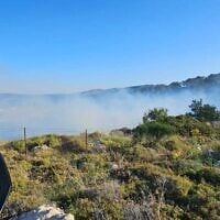 Smoke billows from a fire in the Jerusalem Hills, near the city of Beit Shemesh, apparently as a result of interceptor shrapnel following a missile attack by Yemen's Iran-backed Houthi rebels, April 18, 2025. (Israel Police)