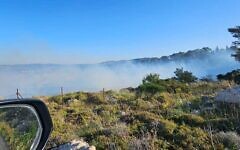 Smoke billows from a fire in the Jerusalem Hills, near the city of Beit Shemesh, apparently as a result of interceptor shrapnel following a missile attack by Yemen's Iran-backed Houthi rebels, April 18, 2025. (Israel Police)