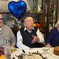 Berysz Aurbach, center, at his 104th birthday party in Melbourne, Australia. (Courtesy of Moshe Aurbach)