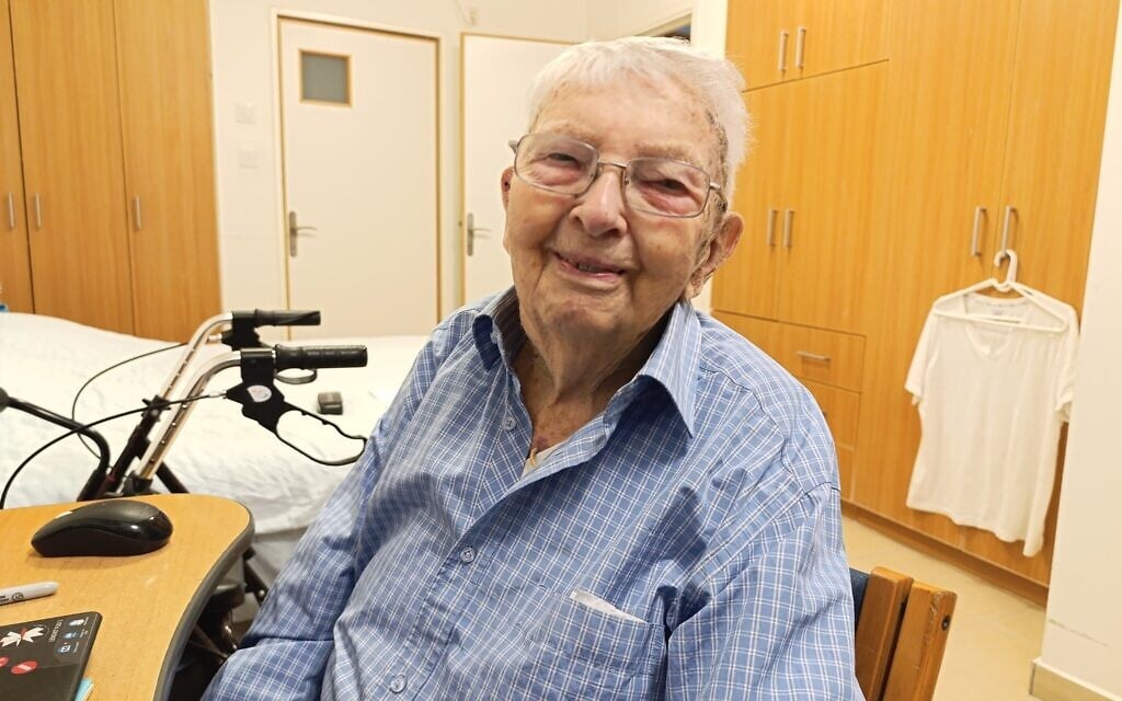 Michael Smuss in his home. (Zev Stub/Times of Israel) Michael Smuss in his home. (Zev Stub/Times of Israel)