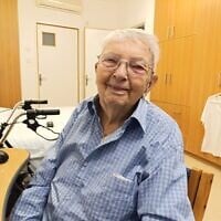 Michael Smuss in his home. (Zev Stub/Times of Israel)