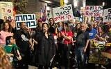 Noam Dan, a relative of freed hostage Ofer Calderon, speaks to protesters outside Prime Minister Benjamin Netanyahu's private residence in Jerusalem on April 17, 2025. (Charlie Summers/Times of Israel)