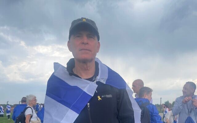 Released hostage Keith Siegel at Birkenau during the March of the Living on April 24, 2025 (Jessica Steinberg/Times of Israel)