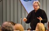 Michael Tilson Thomas conducting the Boston Symphony Orchestra at Tanglewood, in Beethoven's 9th Symphony, the Ode to Joy, on August 28, 2022. It was Tilson Thomas's last concert with the BSO, where he began his career in 1969, as its assistant conductor and pianist. (Hilary Scott/Courtesy Boston Symphony Orchestra via JTA)