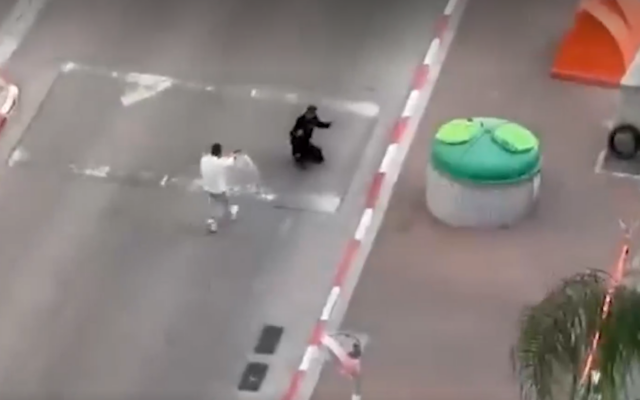 A screenshot from video footage of a gunfight that took place in the northern city of Afula on April 4, 2025. (Ynet screenshot) A screenshot from video footage of a gunfight that took place in the northern city of Afula on April 4, 2025. (Ynet screenshot)