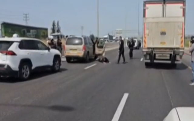 Police and Shin Bet agents arrest nine West Bank Palestinians on Route 6, near Kafr Qasim interchange suspected of being en route to carry out a terror attack in Israel on April 7, 2025. (Screenshot/Channel 12) Police and Shin Bet agents arrest nine West Bank Palestinians on Route 6, near Kafr Qasim interchange suspected of being en route to carry out a terror attack in Israel on April 7, 2025. (Screenshot/Channel 12)
