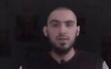 Hostage Rom Braslavski speaks in a propaganda video newly cleared for publication by his family on April 22, 2025. (Screenshot/X)