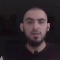 Hostage Rom Braslavski speaks in a propaganda video newly cleared for publication by his family on April 22, 2025. (Screenshot/X)
