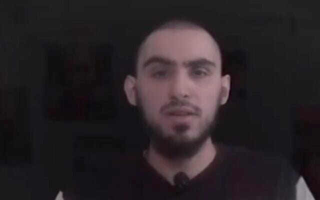 Hostage Rom Braslavski speaks in a propaganda video newly cleared for publication by his family on April 22, 2025. (Screenshot/X)