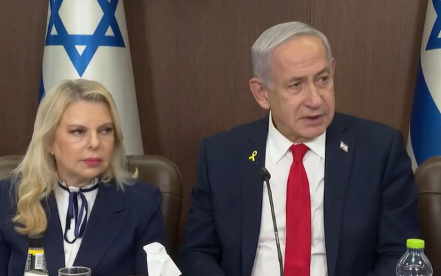 Sara Netanyahu, left, and her husband Prime Minister Benjamin Netanyahu speak to slated Independence Day torch-bearers at the Prime Minister's Office in Jerusalem, April 28, 2025. (Screen capture: Government Press Office)