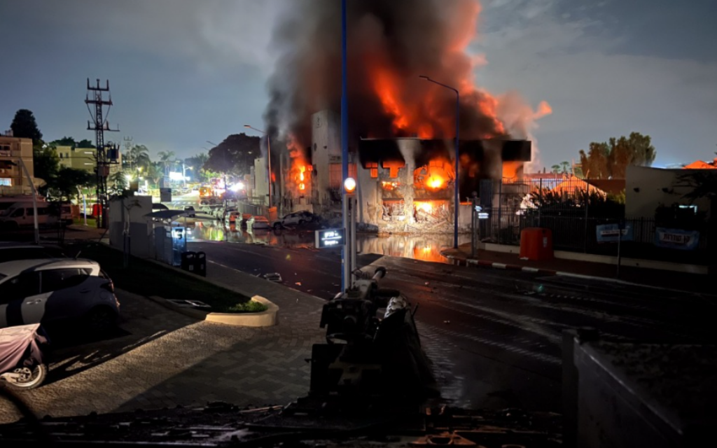 This photo taken from an IDF tank on October 7, 2023, shows the burning Sderot police station after it was attacked by Hamas terrorists (Israel Defense Forces)