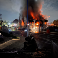 This photo taken from an IDF tank on October 7, 2023, shows the burning Sderot police station after it was attacked by Hamas terrorists. (Israel Defense Forces)
