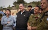 Finance Minister Bezalel Smotrich (left) and Defense Minister Israel Katz (center) tour West Bank settlements alongside senior IDF officials, April 1, 2025. (Elad Malka/Defense Ministry)
