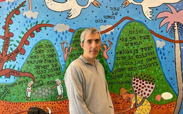 Dr. Doron Yaakov, head of the Jewish Oral Traditions collection at the Academy of Hebrew Language and researcher at the Historical Dictionary Project, at the  Cultural and Educational Center on March 24, 2025. (Rossella Tercatin/Times of Israel)