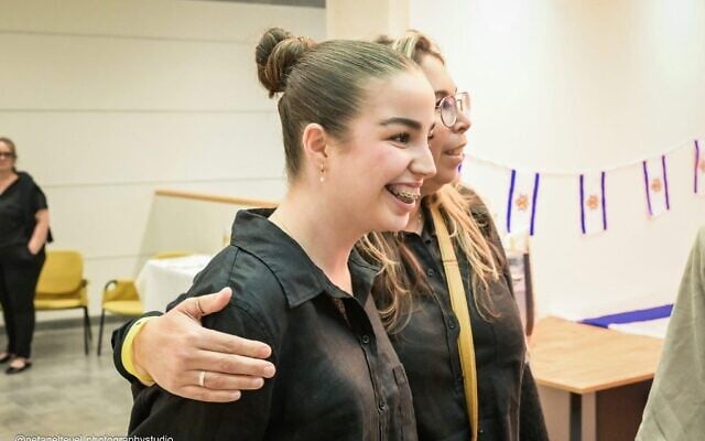 Released hostage Agam Berger in Jerusalem with the Lu Yehi Orchestra on April 8, 2025 (Courtesy)