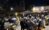Israelis hold a Passover seder at Hostages Square in Tel Aviv on April 12, 2025. (Dana Reany/Hostages Family Forum)