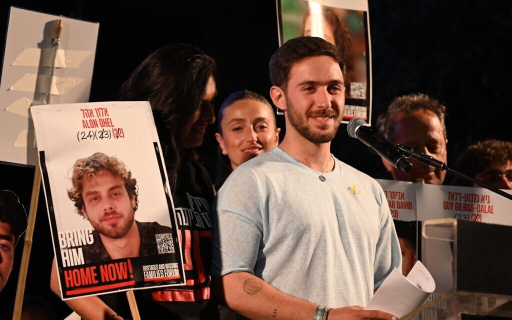 Released hostage Omer Shem Tov speaks at Hostages Square in Tel Aviv, April 19, 2025. (Paulina Patimer/Hostages and Missing Families Forum)