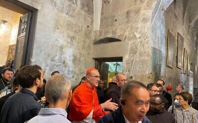Cardinal Pierbattista Pizzaballa, the Latin Patriarch of Jerusalem, greeting Christians gathered at the Church of the Holy Sepulchre in Jerusalem for a mass honoring Pope Francis on April 23, 2025. (Rossella Tercatin/Times of Israel)
