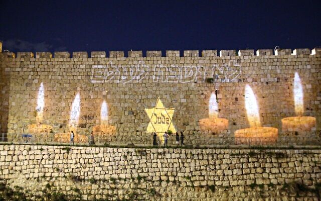 The walls of Jerusalem's Old City are lit up for Holocaust Remembrance Day, April 23, 2025. (Arnon Bossani) The walls of Jerusalem's Old City are lit up for Holocaust Remembrance Day, April 23, 2025. (Arnon Bossani)