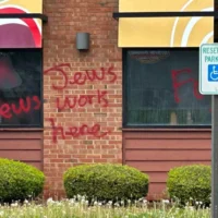 Antisemitic grafitti at an Applebee's in a suburb of Daytona, Ohio. (Courtesy of April Dunn via JTA)
