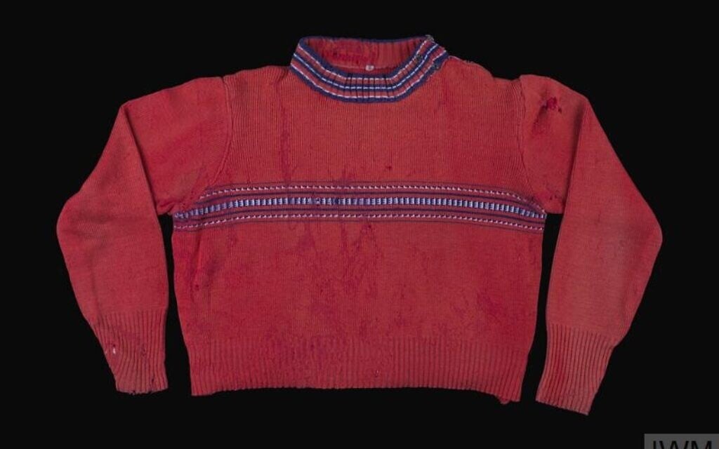 Child's jumper (sweater) belonging to  Jochewet 'Jock" Heiden (née Heidenstein). Her parents bought the same jumper for her and her two younger sisters. (Copyright: © Imperial War Museums, image EPH 3909.)