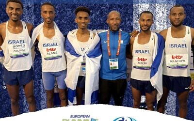 Israel's men's marathon team, gold medal winners at the European Athletics Championships in Brussels, April 13, 2025. Gashau Ayale, Maru Teferl and Haimro Alame finished second, third and fourth, respectively, in the men's competition, securing first place overall for the Israeli squad. (Israeli Athletic association)