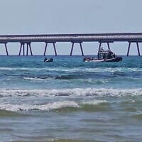 Police search for a diver who was attacked by a shark off the coast of Hadera, on April 21, 2025. (Israel Police)