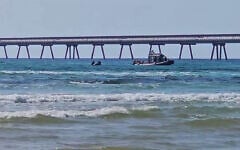 Police search for a diver who was attacked by a shark off the coast of Hadera, on April 21, 2025. (Israel Police)
