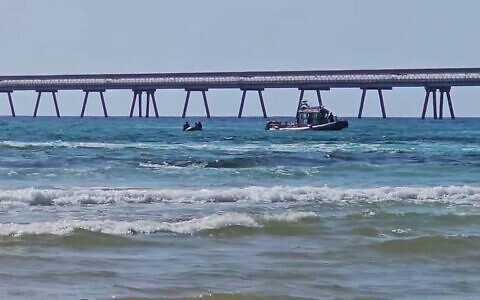 Police search for a diver who was attacked by a shark off the coast of Hadera, on April 21, 2025. (Israel Police)