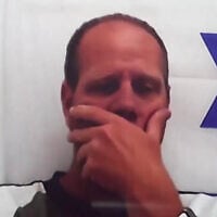 Screen capture from video during a court hearing of Eliran Bakalo, a volunteer with Magen David Adom who was arrested on suspicion of sexual assault against three female volunteers, two of whom were teenagers. (Walla: Used in accordance with Clause 27a of the Copyright Law)