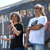Yehuda (right) and Vicky Cohen, the parents of 20-year-old Hamas captive Nimrod Cohen, speak near the Gaza border at a hostage families demonstration on April 20, 2025. (Lior Rotstein/Hostages and Missing Families Forum)
