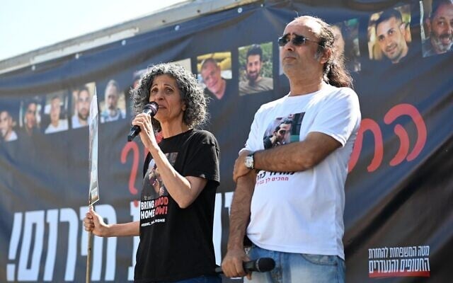 Yehuda (right) and Vicky Cohen, the parents of 20-year-old Hamas captive Nimrod Cohen, speak near the Gaza border at a hostage families demonstration on April 20, 2025. (Lior Rotstein/Hostages and Missing Families Forum)