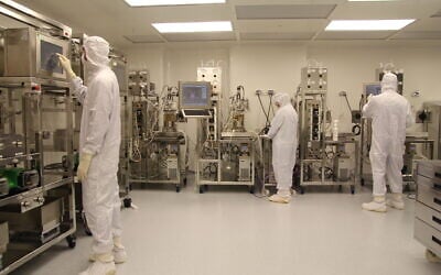Pluri employees at the Israeli biotech firm's cell therapy production facility in Haifa. (Courtesy/Michael Brikman)