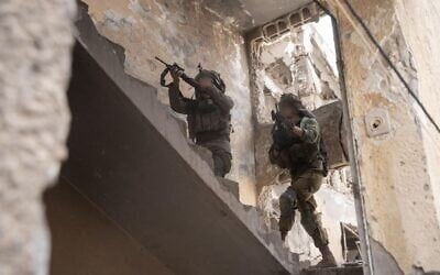 IDF troops operate in the Shejaiya neighborhood in Gaza City, in images released on May 3, 2025. (Israel Defense Forces)