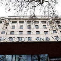 A general view of a signage outside New Scotland Yard, the headquarters of the Metropolitan Police, in London, March 21, 2023. (Reuters/Peter Nicholls/File Photo)