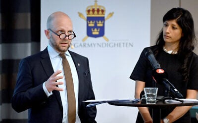 Henrik Olin, Deputy Chief Prosecutor at the National Unit for Security Cases, and Reena Devgun, Senior Prosecutor at the National Unit against International and Organized Crime, announcing indictment of Swedish man Osama Krayem, for gross war crimes and terrorism in Syria, on 27 May 2025 in Stockholm, Sweden. (TT News Agency/Jonas Ekstromer/via REUTERS)