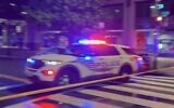 A police vehicle is seen at the scene of a deadly shooting near the Jewish Museum in Washington, May 21, 2025. (X screenshot)
