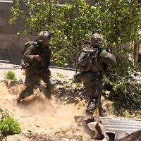 IDF troops operate in the Gaza Strip, in an image released on May 24, 2025. (Israel Defense Forces)