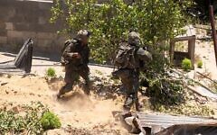 IDF troops operate in the Gaza Strip, in an image released on May 24, 2025. (Israel Defense Forces)