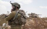 IDF troops operate in the Gaza Strip, in a handout photo published on May 11, 2025. (Israel Defense Forces)