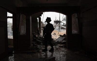 Troops of the Golani Brigade operate in southern Gaza's Rafah, in a handout photo issued on May 10, 2025. (Israel Defense FOrces) Troops of the Golani Brigade operate in southern Gaza's Rafah, in a handout photo issued on May 10, 2025. (Israel Defense FOrces)