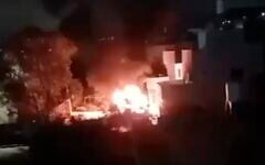 A screenshot from social media shows a fire during a reported settler attack on the West Bank village of Bruqin, early May 22, 2025. (X screenshot)