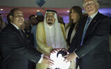 US President Donald Trump (R) and US First Lady Melania Trump (2nd R), posing for a picture with Egyptian President Abdel Fattah el-Sissi (L) and Saudi Arabia's then king Salman bin Abdulaziz al-Saud during the inauguration of the Global Center for Combating Extremist Ideology "Etidal" in Riyadh, May 21, 2017. (BANDAR AL-JALOUD / Saudi Royal Palace / AFP)