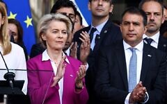 European Commission President Ursula Von der Leyen (left) and Israeli Ambassador to the EU and NATO Haim Regev (right) take part in a tribute to the victims of the October 7 attack, at the European Parliament in Brussels, October 11, 2023. (Kenzo TRIBOUILLARD / AFP)