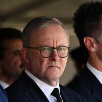 Australian Prime Minister Anthony Albanese (C) along with then-industry and science minister Ed Husic (L) and New South Wales Premier Chris Minns attend the funeral of Pakistani security guard Faraz Tahir at Baitul Huda mosque in Sydney on April 26, 2024. (Saeed KHAN / AFP)