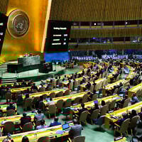 The results of a vote on a resolution for the UN Security Council to reconsider and support full UN membership for the Palestinian Authority as the State of Palestine is displayed during a special session of the UN General Assembly, at UN headquarters in New York, May 10, 2024. (Charly TRIBALLEAU / AFP)