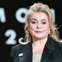 French actress Catherine Deneuve looks on during the 50th edition of the Cesar Film Awards ceremony at the Olympia venue in Paris, France, February 28, 2025. (Bertrand Guay / AFP)